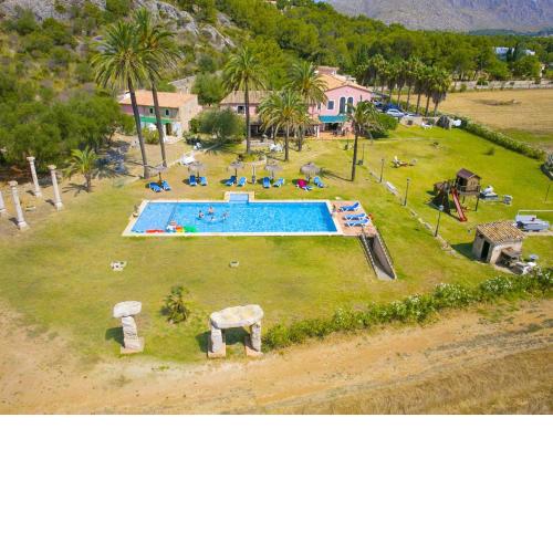 2 bedrooms appartement with shared pool enclosed garden and wifi at Pollenca 1 km away from the beach