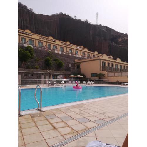 2 bedrooms appartement with shared pool furnished terrace and wifi at Mogan 2 km away from the beach