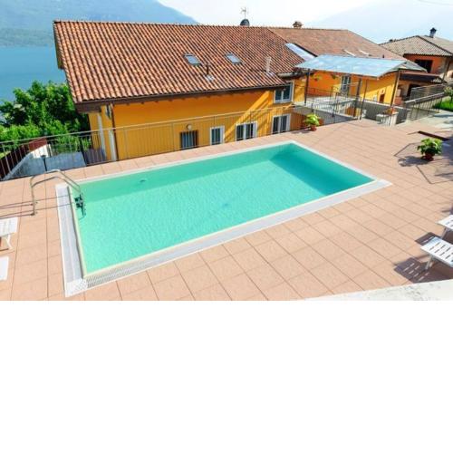 2 bedrooms house with lake view shared pool and furnished balcony at Vercana 2 km away from the beach