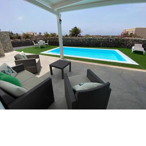 2 bedrooms villa with sea view private pool and enclosed garden at El Roque El Cotillo 1 km away from the beach