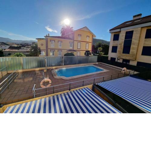 20A01 - Precioso apartamento con piscina y garaje