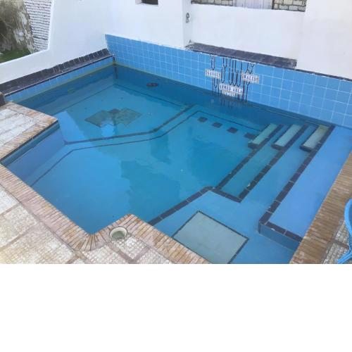 2nd row, Semi-detached chalet with pool on beach!