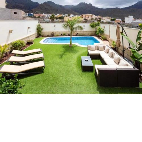 4 bedrooms villa with sea view private pool and enclosed garden at Adeje 3 km away from the beach
