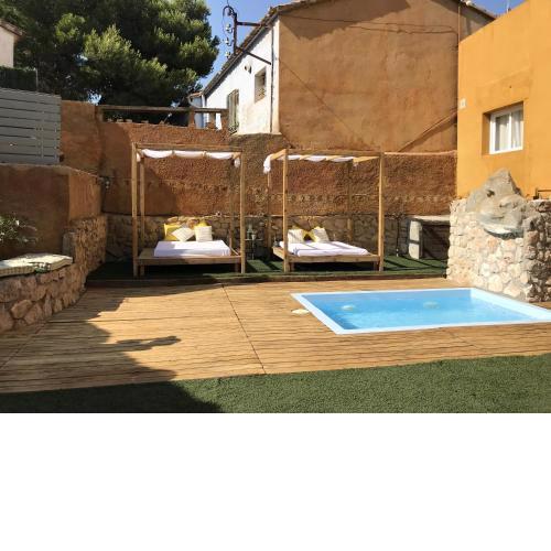 5 bedrooms house with private pool enclosed garden and wifi at Can Trabal