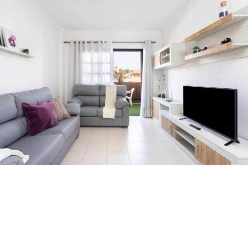 Agradable piso con piscina y playa terraza y WIFI