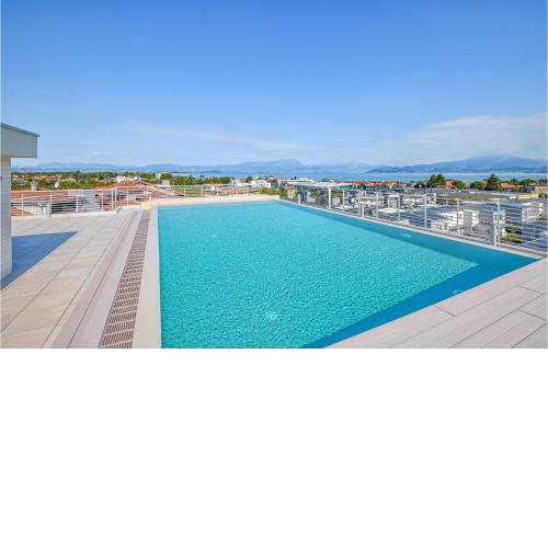 Amazing apartment in San Benedetto di Lugan with Outdoor swimming pool, WiFi and Heated swimming pool