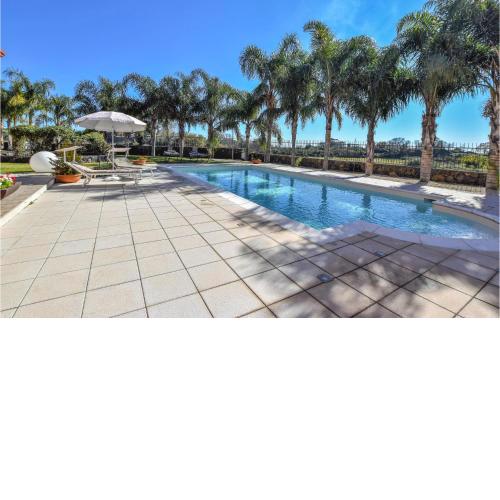 Amazing home in Acireale with Outdoor swimming pool, Swimming pool and 2 Bedrooms