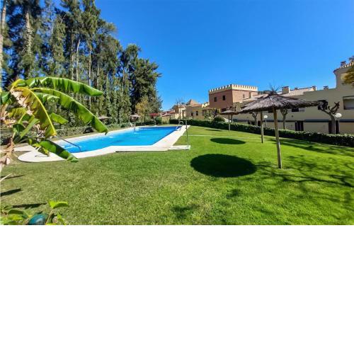 Amazing home in Islantilla with Outdoor swimming pool, WiFi and 2 Bedrooms