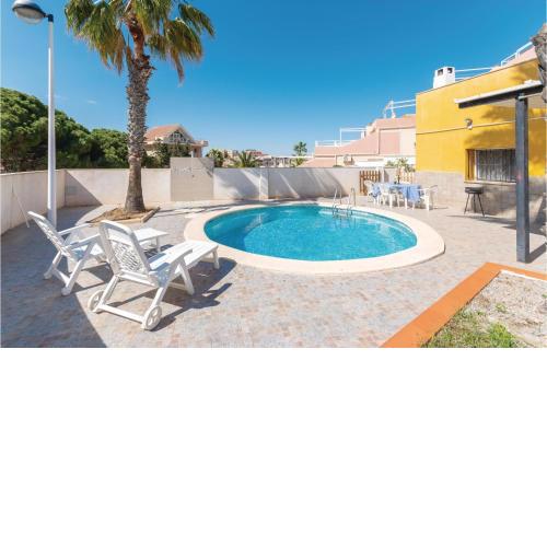 Amazing home in La Manga with 3 Bedrooms and Outdoor swimming pool