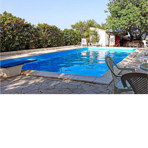 Amazing home in Modica with Outdoor swimming pool, WiFi and 4 Bedrooms