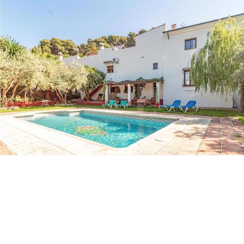 Amazing home in Montecorto with 3 Bedrooms, WiFi and Outdoor swimming pool