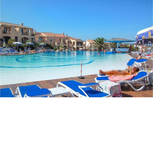 Amazing home in Punta Su Turrione with Outdoor swimming pool and 2 Bedrooms