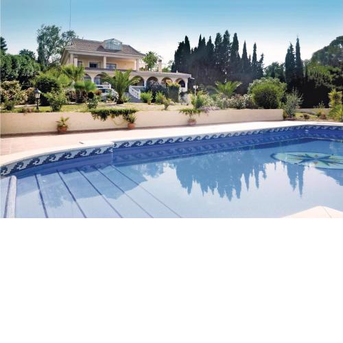 Amazing home in Torremolinos with 5 Bedrooms, WiFi and Outdoor swimming pool