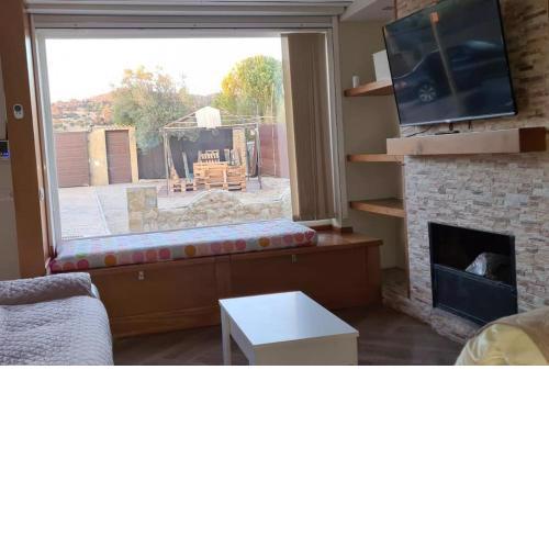 Amplio chalet con chimenea y terraza con barbacoa
