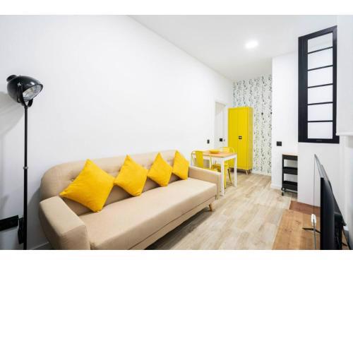 Apartamento amarillo en Atocha