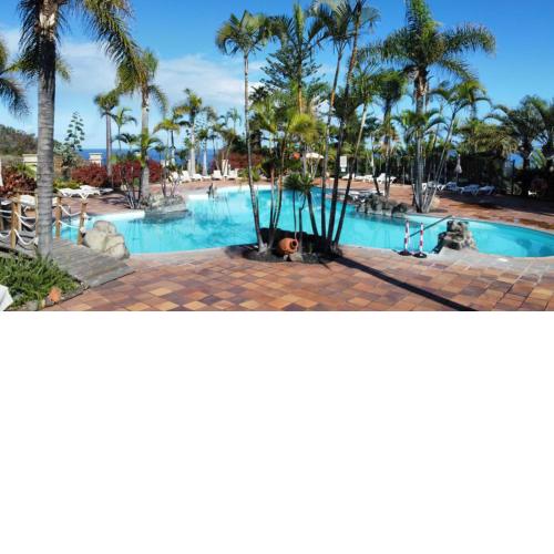 Apartamento AP1 en Playa de Los Roques, frente de la playa, con piscina y Wifi