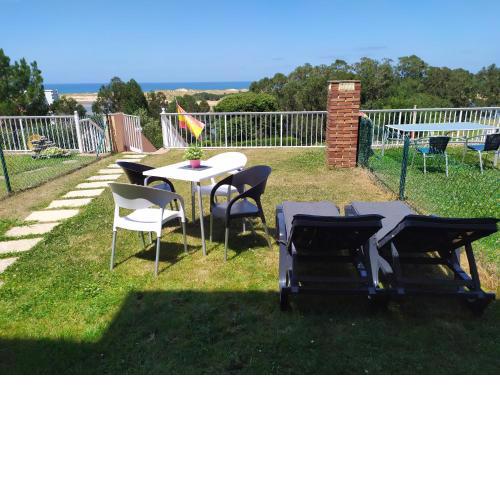 Apartamento con jardin privado junto playa Usil - Mogro