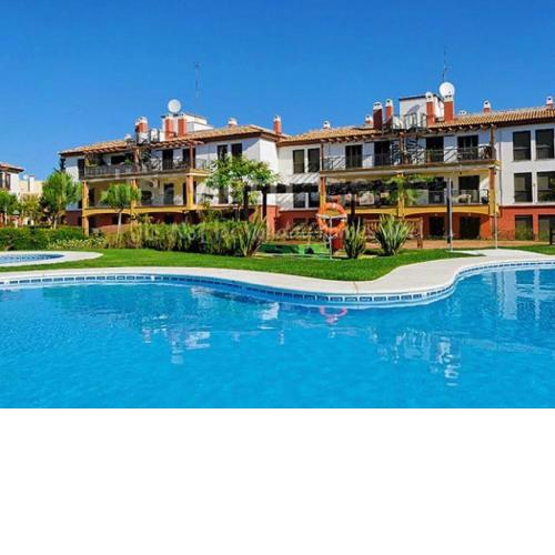 Apartamento con jardín privado y acceso a piscina