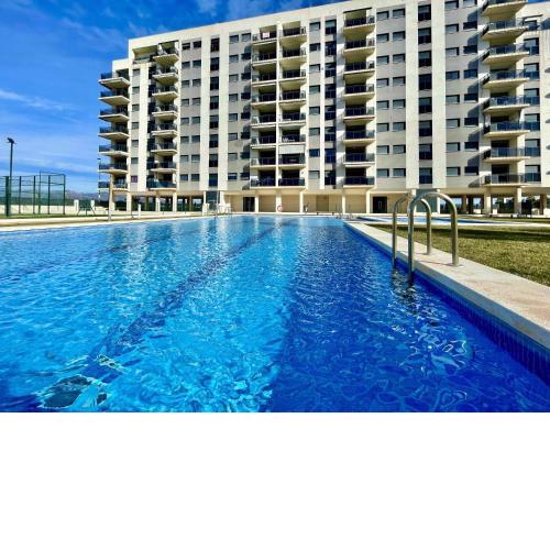 Apartamento con piscina padel y vistas al mar
