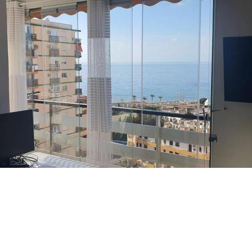 Apartamento con terraza a pie de playa