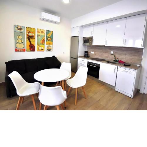 Apartamento con terraza frente al mar