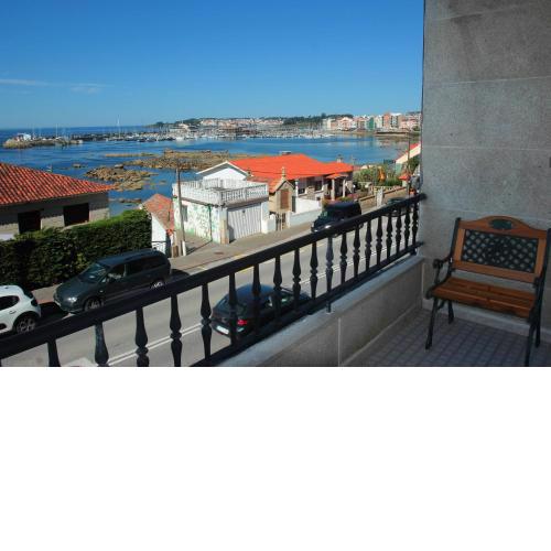Apartamento con vistas al Puerto Deportivo y parking, a 20m de la playa