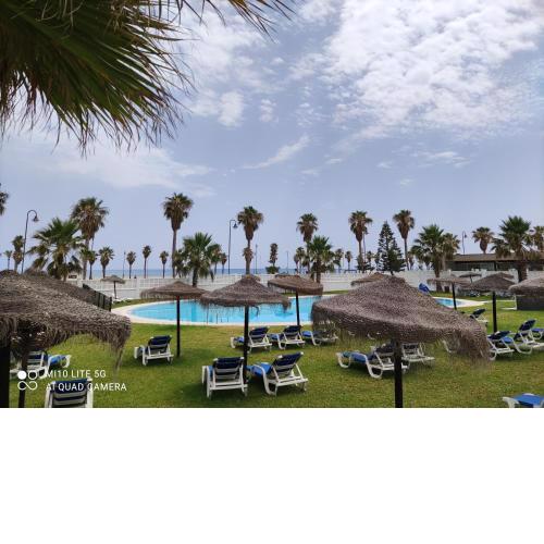 Apartamento de Lujo en primera linea playa, Piscina, Tenis, Padel, Gimnasio, Wifi, Garaje