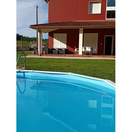Apartamento en bloque vivienda con piscina y barbacoa a 15 min de la playa