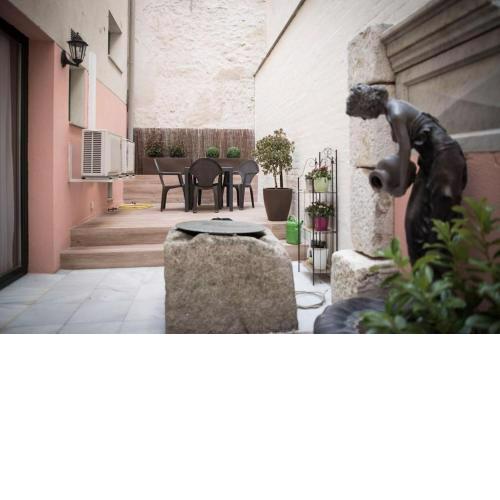 Apartamento en centro histórico con patio romano