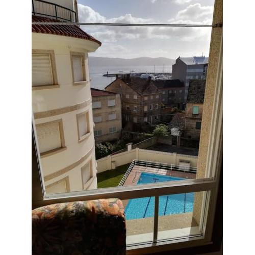 Apartamento en edificio nuevo, con piscina, vistas a la ría y al puerto, ESTANCIA MÍNIMA 14 noches, perfil familiar, no se admiten grupos de jovenes