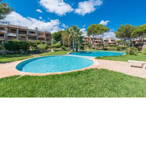 APARTAMENTO JARDIN REY COLAU con piscinas y vistas al mar, 100m de la playa Cala Marsal
