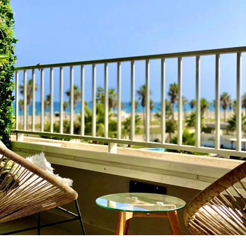 Apartamento Lujo, Primera línea playa, Garaje, Wifi, Piscina climatizada