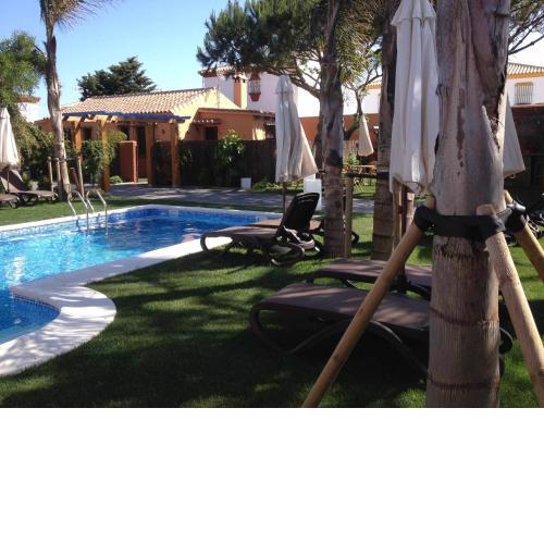 Apartamento para 4 personas con jardín privado y barbacoa cerca de la playa