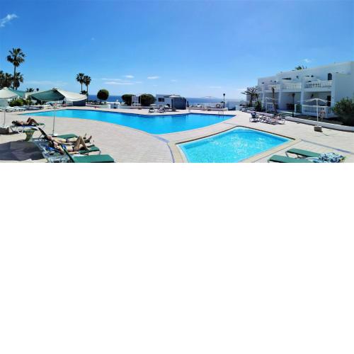 Apartamento Renovado,vistas piscina, aire acondicionado,wifi