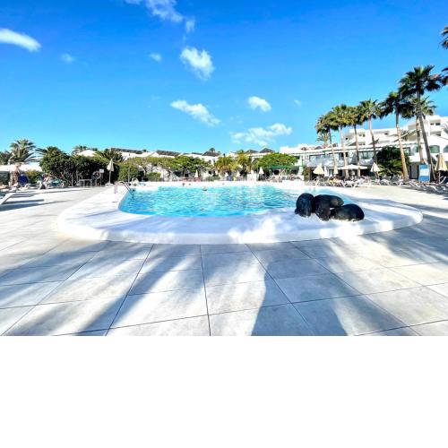 Apartameto de 2 dormitorios, Wifi y piscina, a 4 minutos a pie de la playa