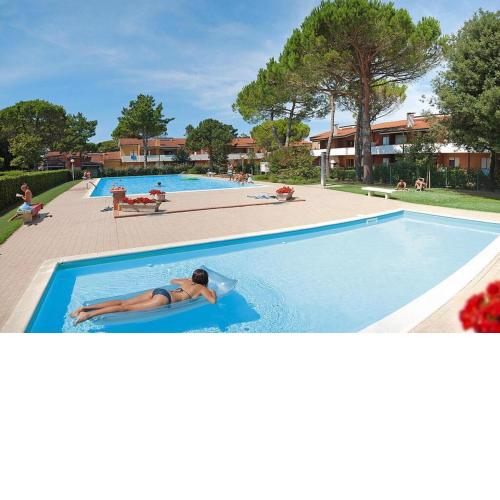 Apartment in Bibione with garden furniture