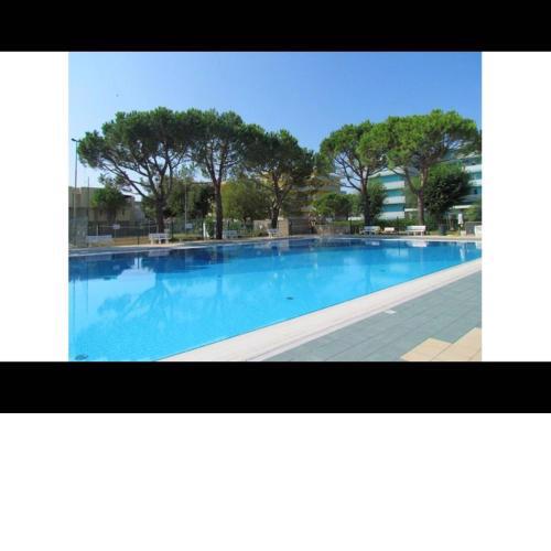 Apartment in Great Resort with 12 swimming pools, tennis -volleyball - kids area