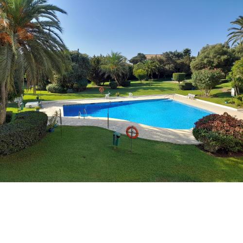 Apartment with pool near the beach