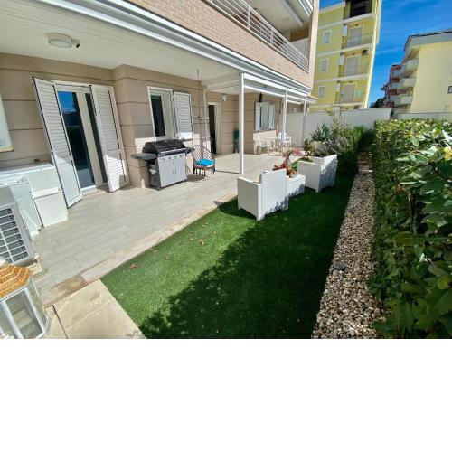 Appartamento al mare con giardino, spiaggia e piscina