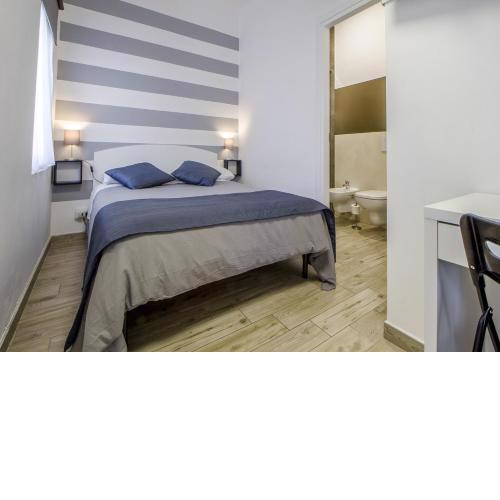Appartamento con 2 camere e 2 bagni in centro con parcheggio