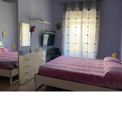 Appartamento con due stanze, bagno e cucina