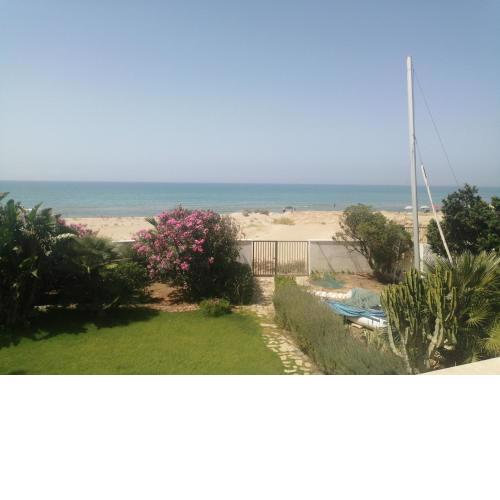 Appartamento con giardino con accesso a mare