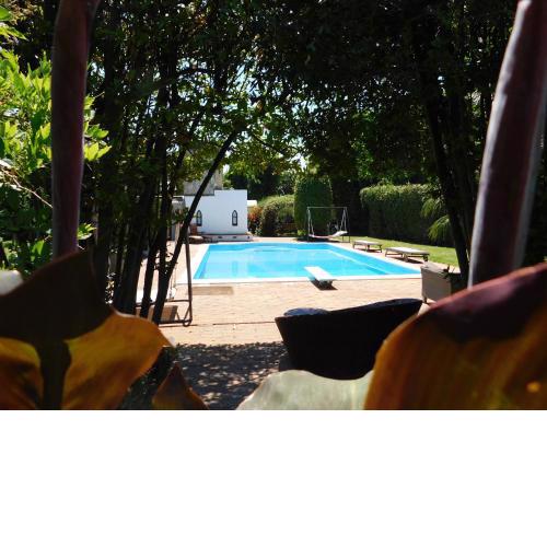 Appartamento con piscina immersa nel verde