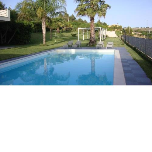 appartamento in moderna villa con piscina