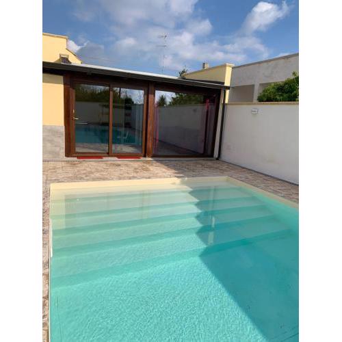 Appartamento in villa con piscina a 700m dal mare