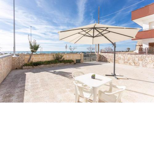 Appartamento La Torre fronte mare piano terra