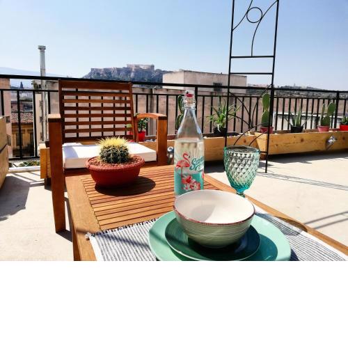 AS jacuzzi on privet roof top with acropolis view