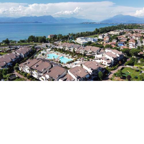 Athena Apartment - Accesso a tre piscine - Green residence
