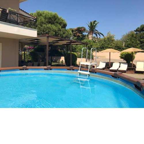 Athenian Riviera Family House