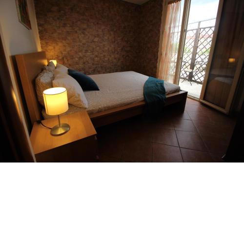 Attico con Jacuzzi, terrazzo e fibra